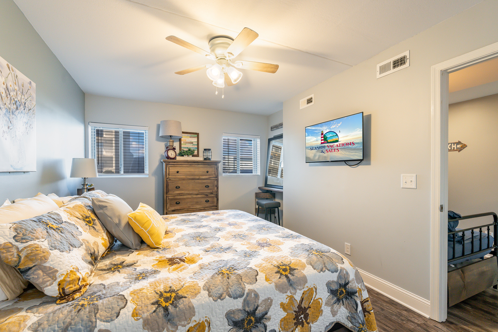 Sink into the Cozy King Bed and enjoy the Flat Screen TV.