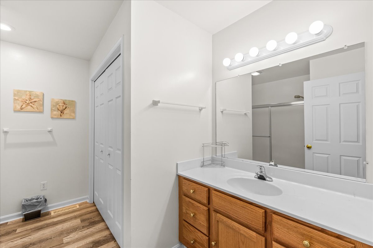 Full Bath 1 has a large Vanity and Tub/Shower Combo.