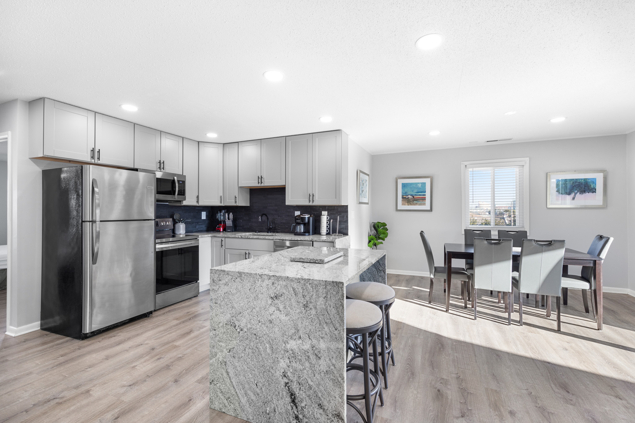 Grab a quick bite to eat at the Beautiful Marble Breakfast Bar before hitting the Beach!