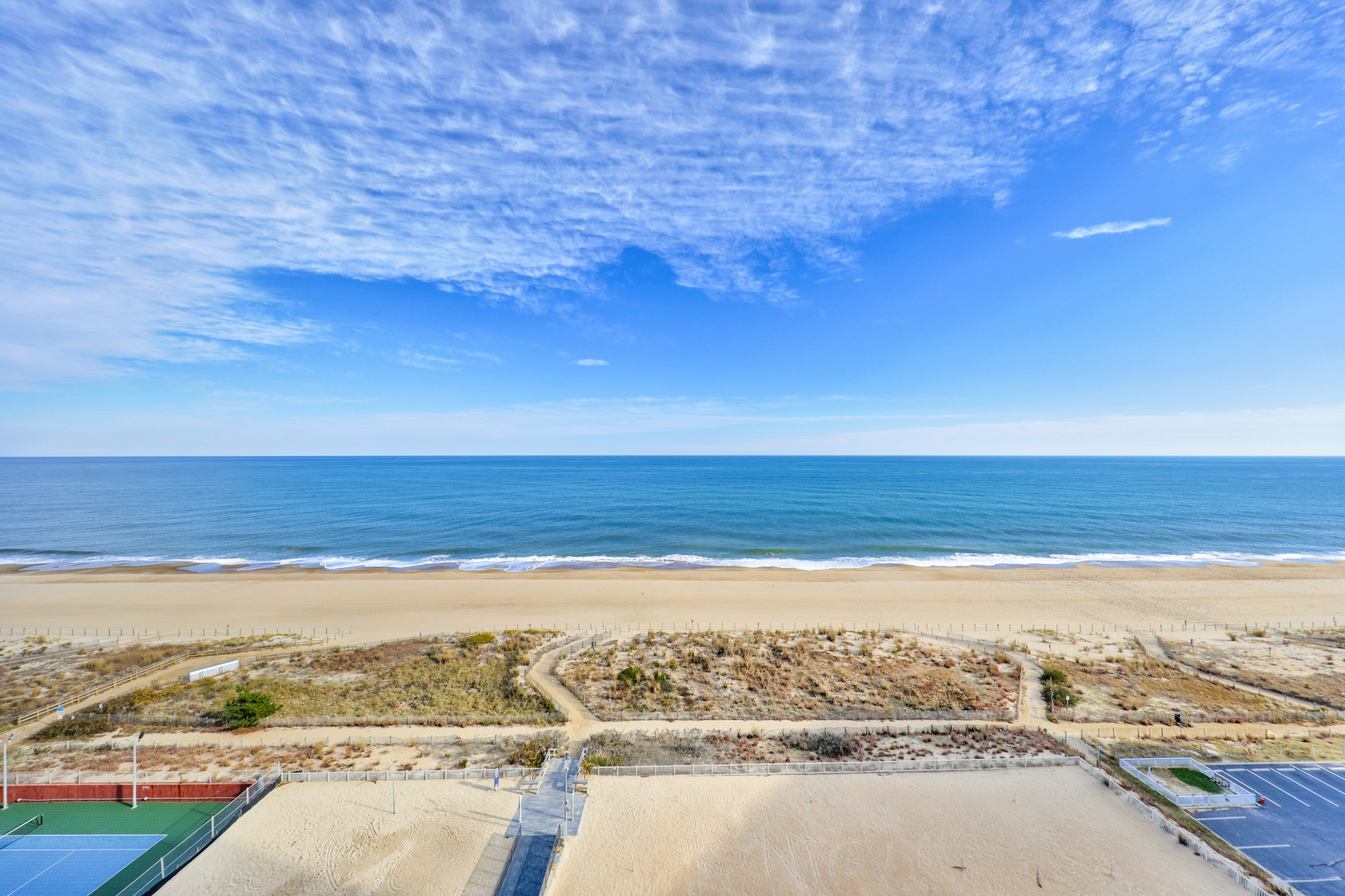 Enjoy private access to the beach. Just steps away from the best beach day ever!