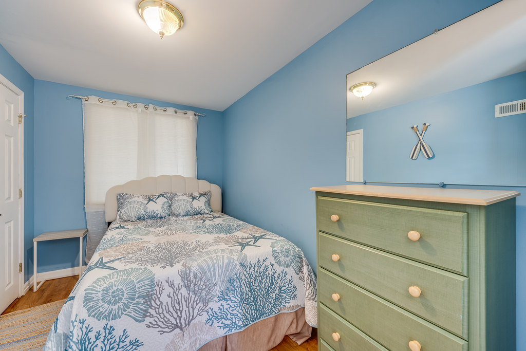 Downstairs, Bedroom 2 also has a Queen Bed.