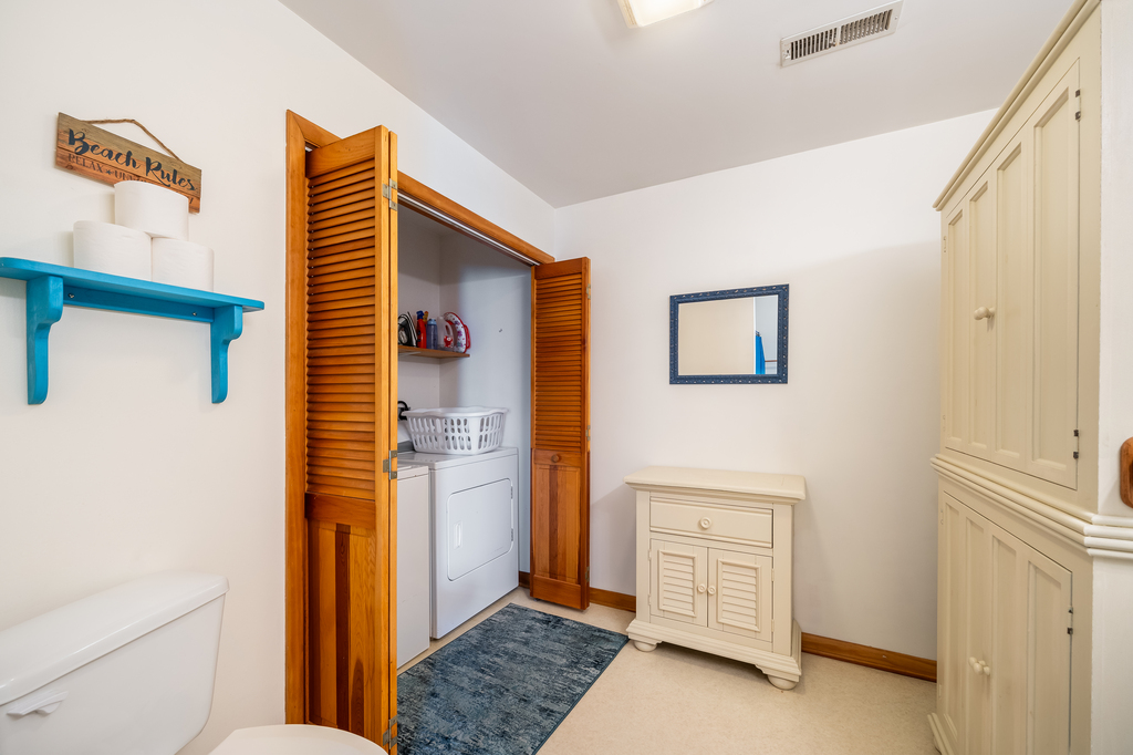 The Full Bath also houses the Full Size Washer and Dryer.