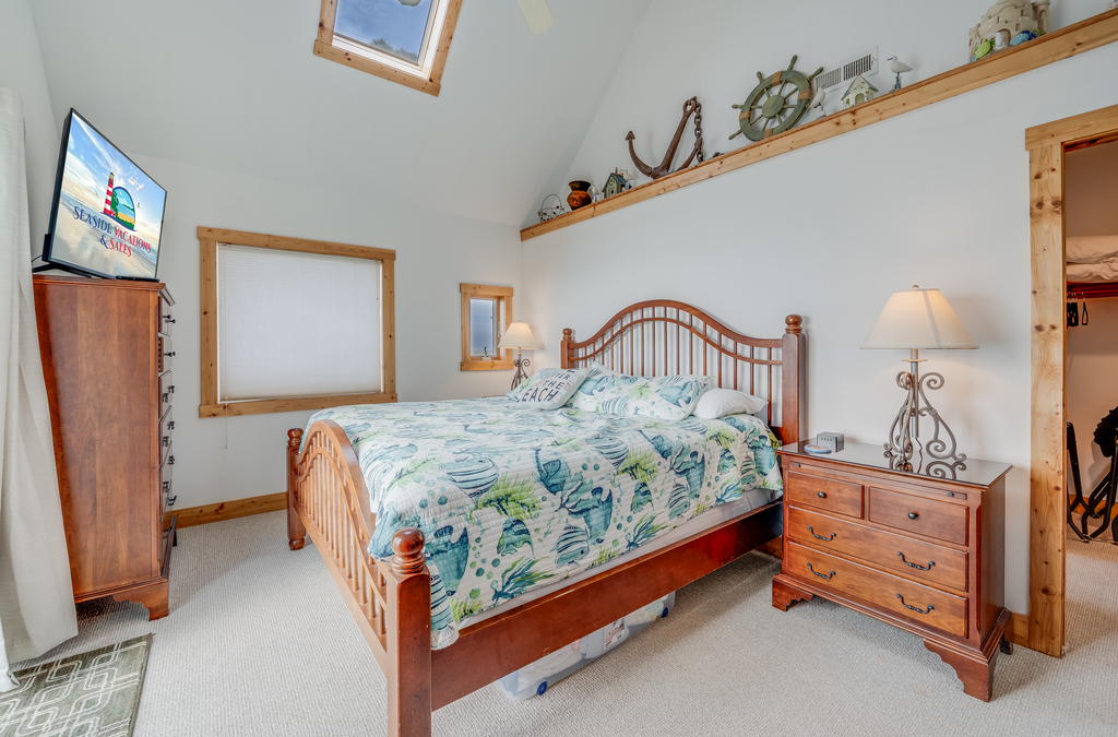 Bedroom 3 has another King Bed, En-Suite Full Bath, and very cool Nautical Accents.