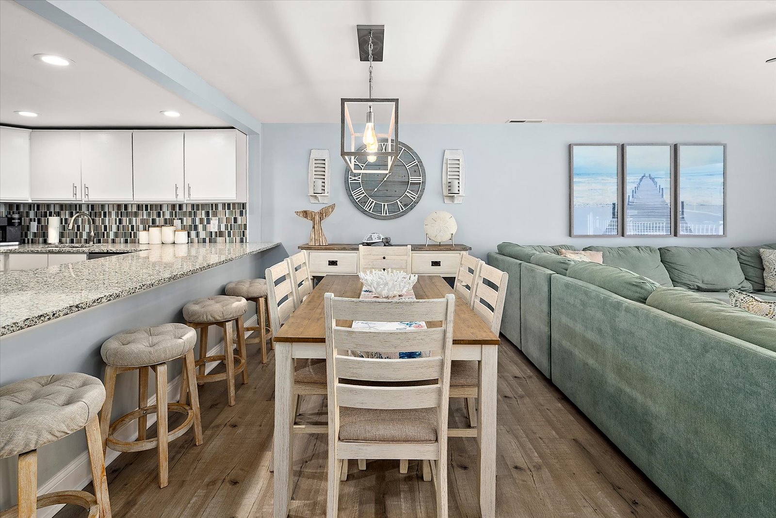 The spacious dining table is perfect for family dinners, game nights, or planning your next beach day adventure.