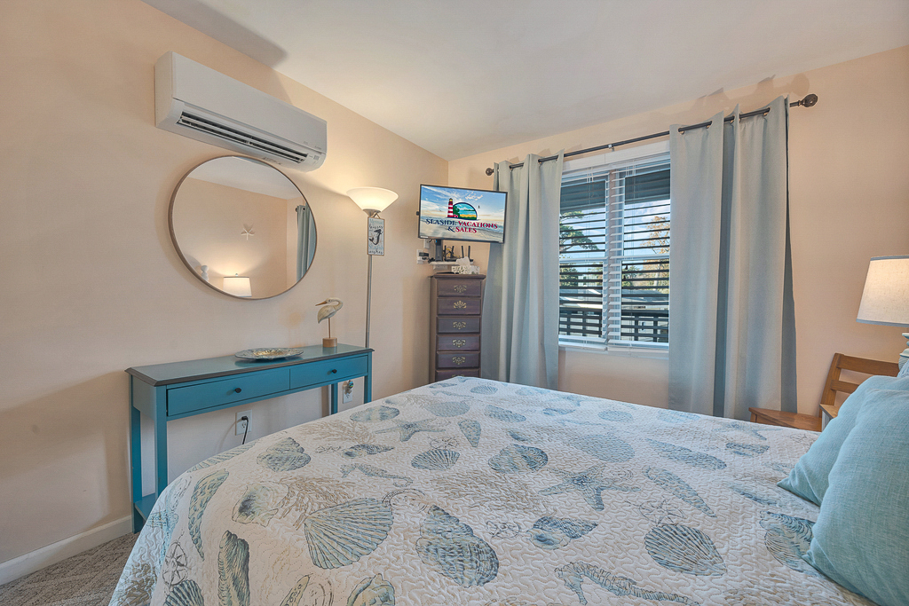 Flat Screen Streaming TV in Bedroom 1.