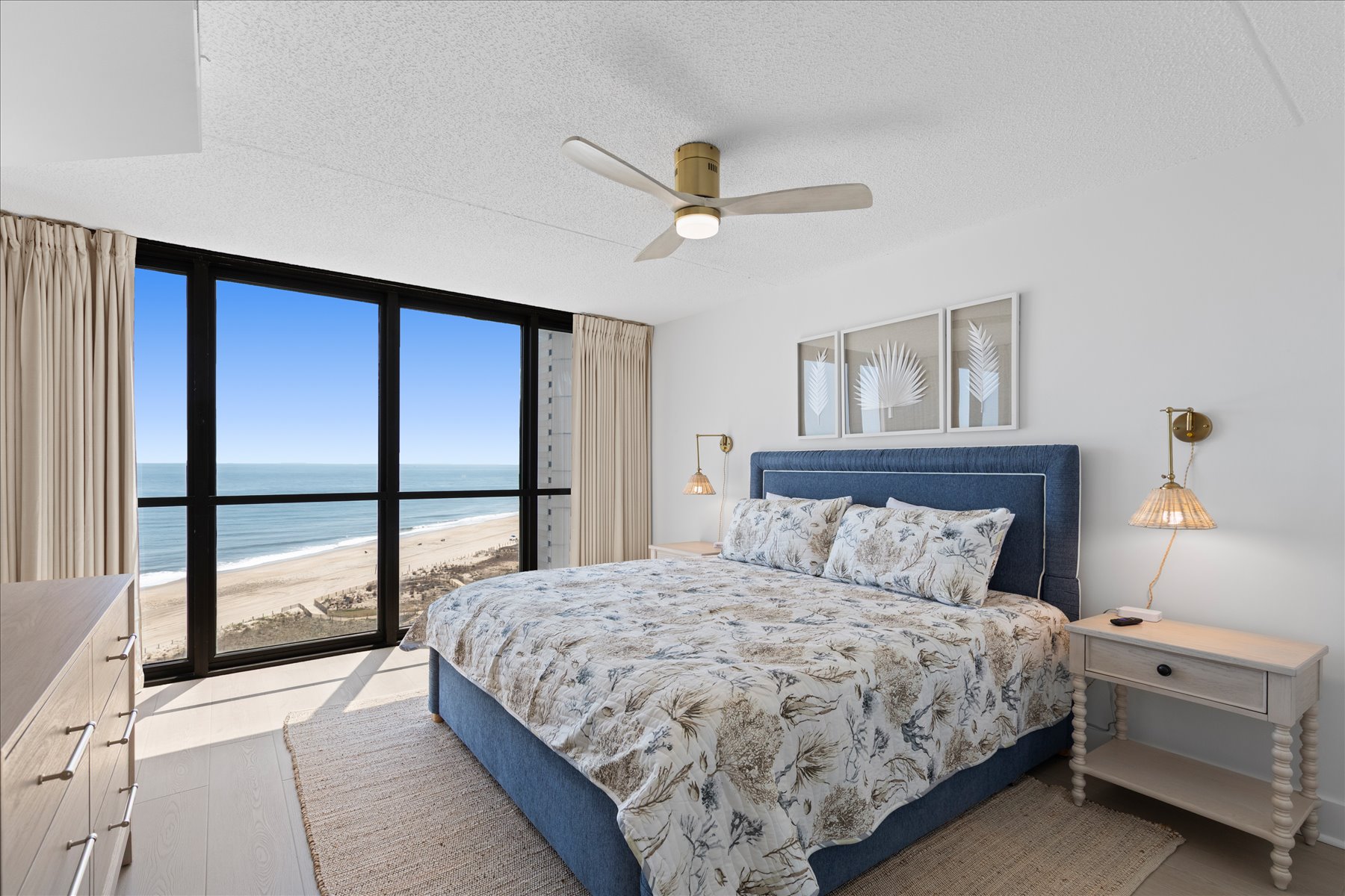 Exquisite Primary bedroom with plush King bed.