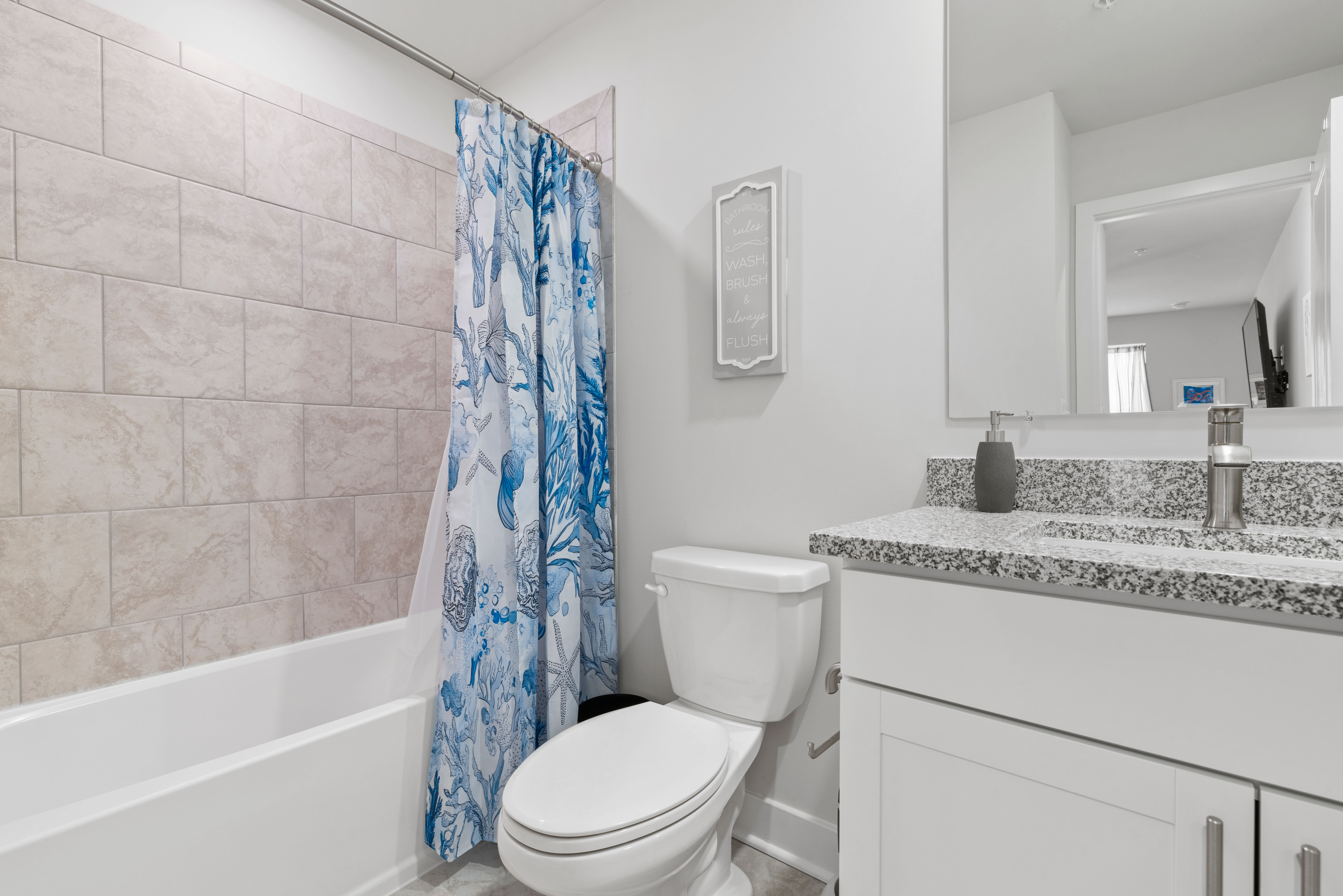 The attached Bath has a Shower/Tub Combo