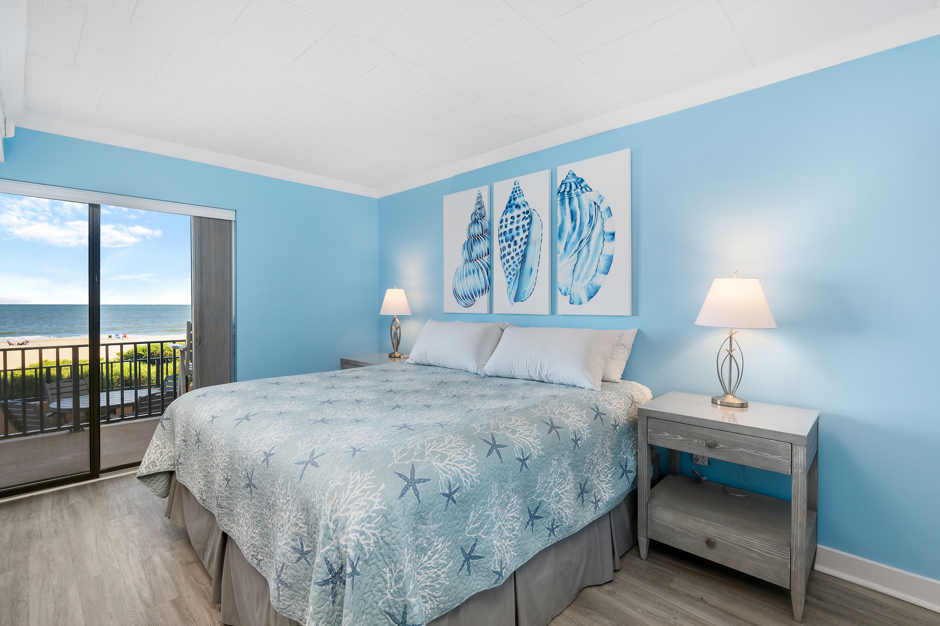 Serene colors of the sea in the Primary Bedroom featuring a King Bed.