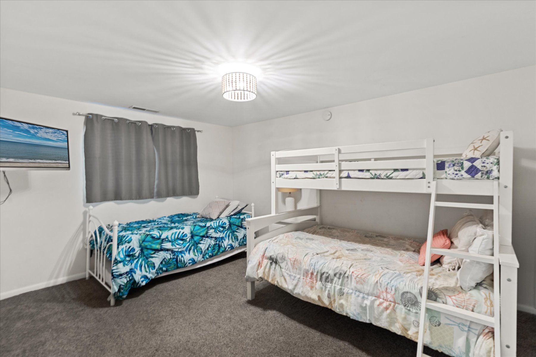 This room features a Pyramid Bunk and a Twin Bed.