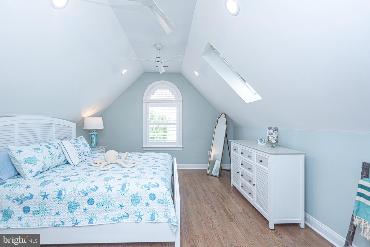 Bedroom 5 with a Plush King Bed and Flat Screen TV.
