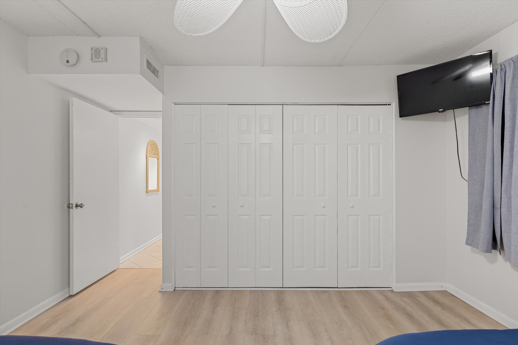 Bedroom 2 offers two Full beds and a Flat Screen TV