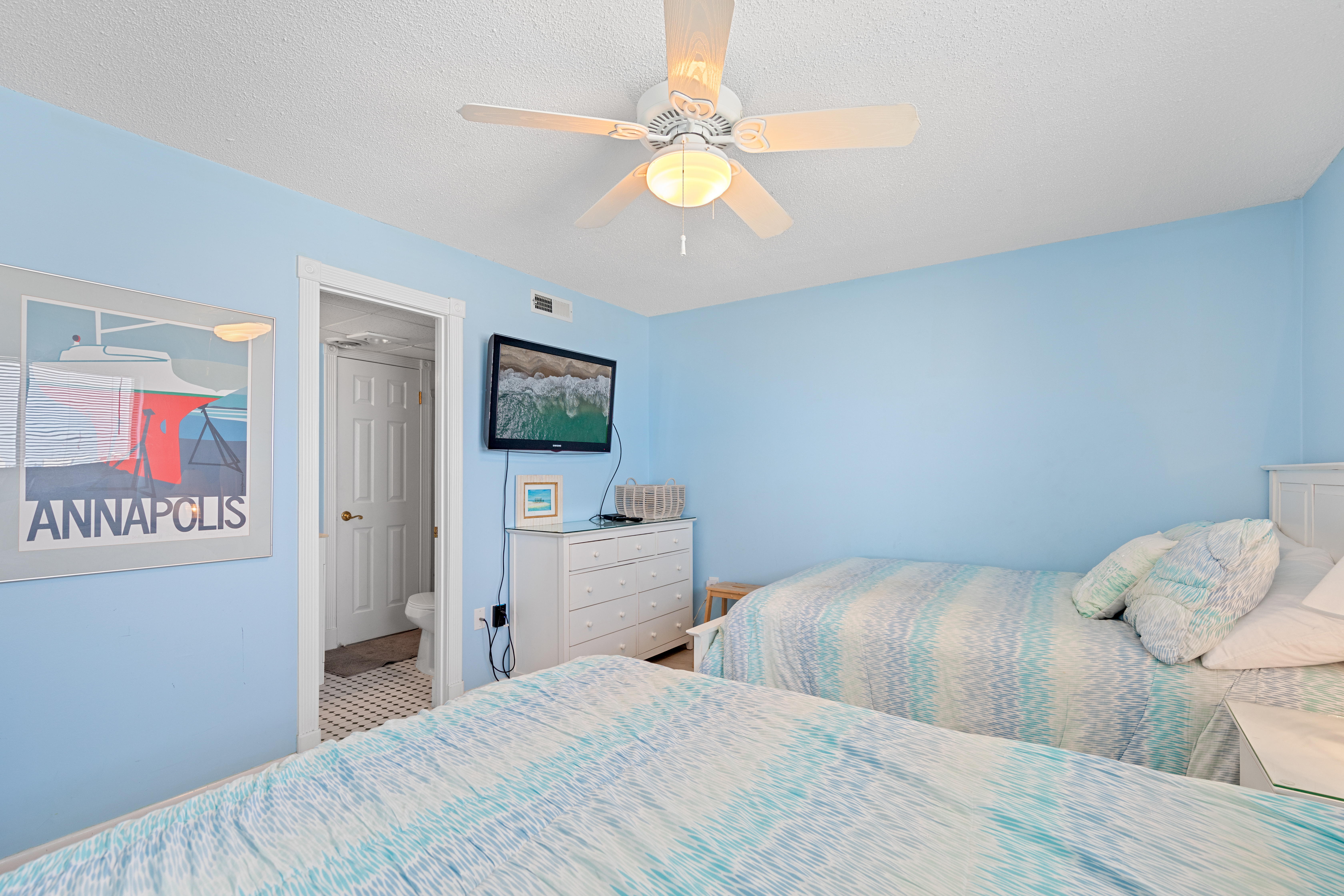 Relax after a fun-filled beach day and enjoy the Flat Screen TV.