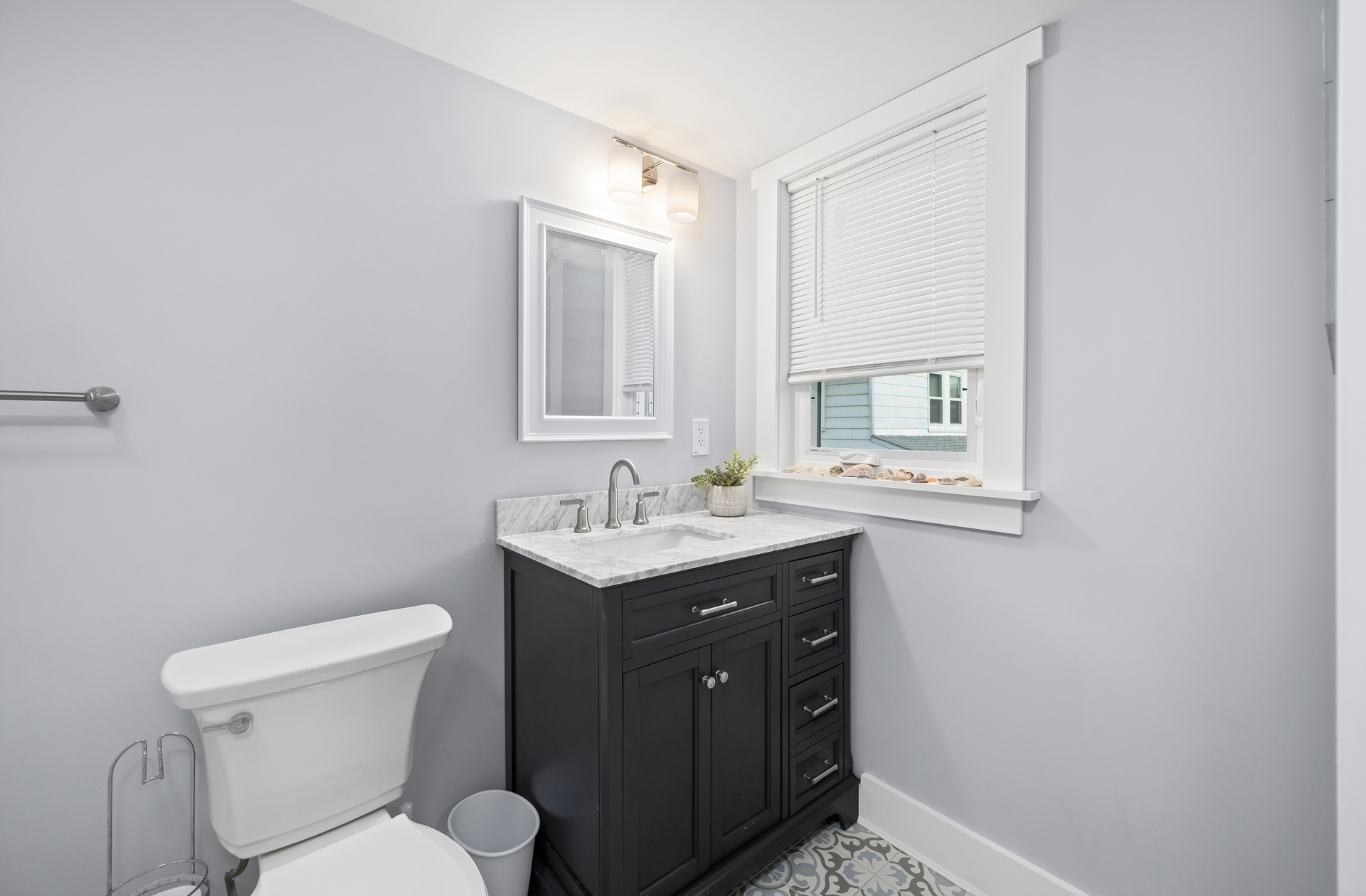 Full Bath 2 on 2nd Floor in striking grays.