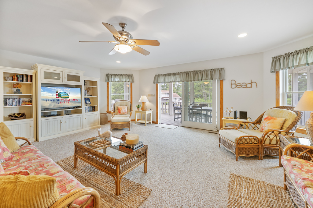 Kick back in the Living Area and enjoy Flat Screen TV and water Views from the sofa!