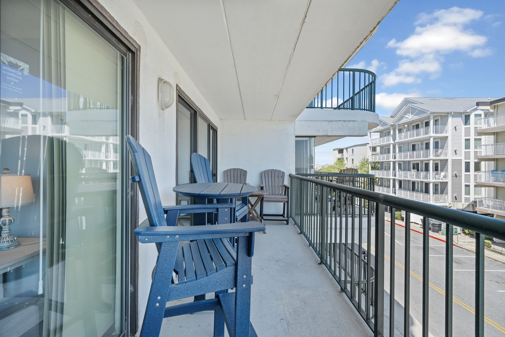 PLENTY of outdoor seating on the balcony for the whole family!
