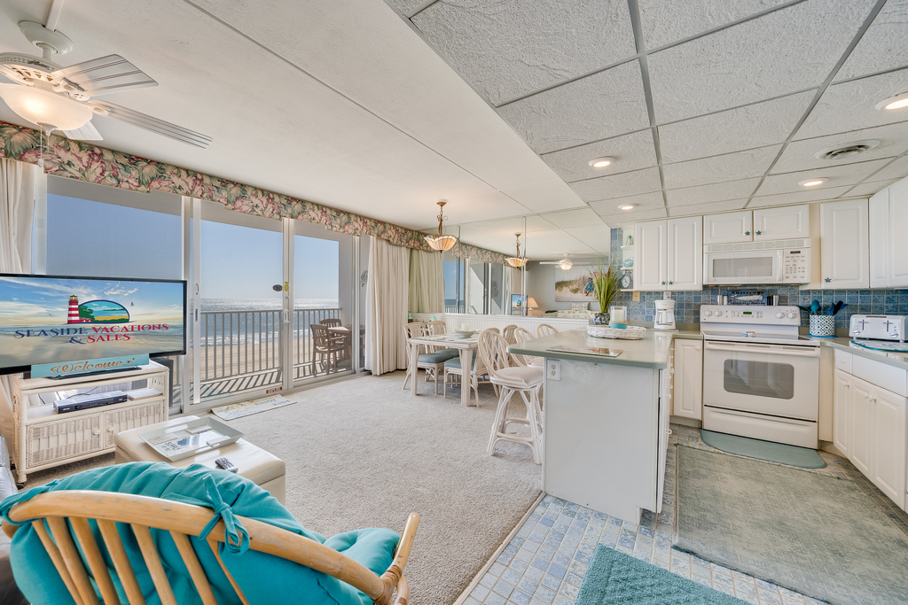 Enjoy the Sunrise from a comfy chair or glide outside to breathe in the Salty Air!