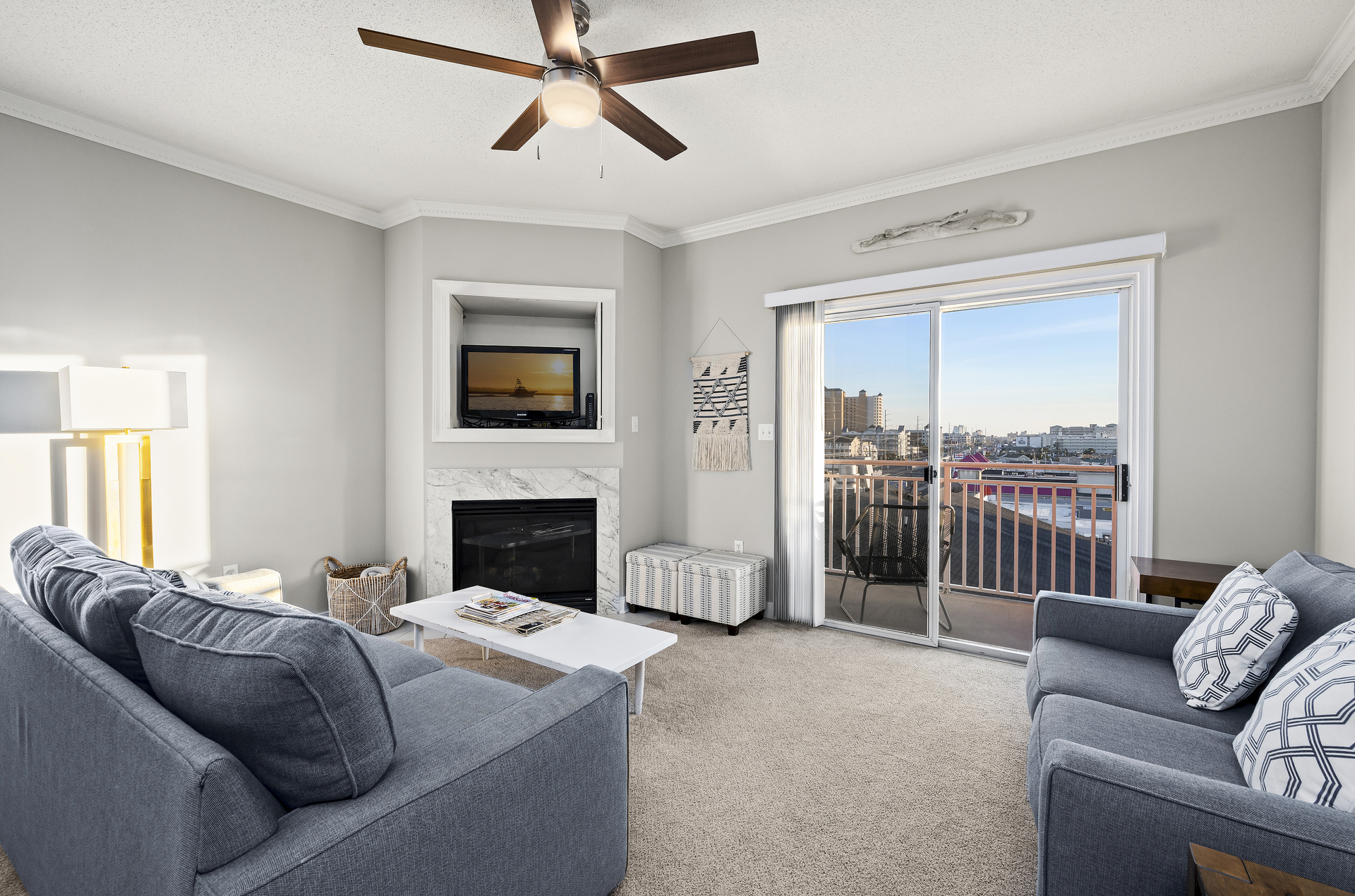 Lovely Views of the Ocean City skyline right from the sofa. Fireplace is decorative only.