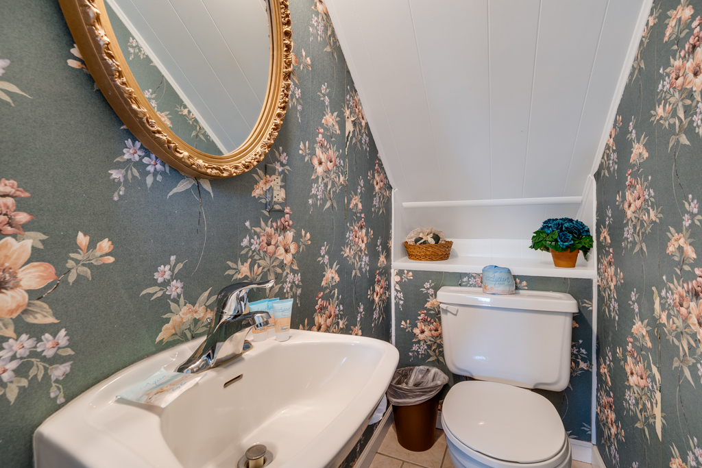 Half Bath tucked just off the Kitchen.