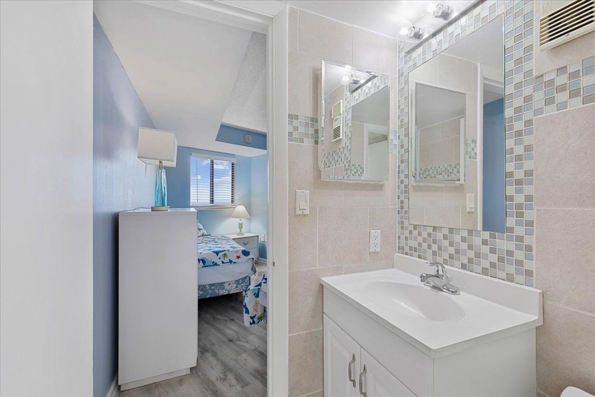 Vanity & Toilet Area off of Bedroom 2.