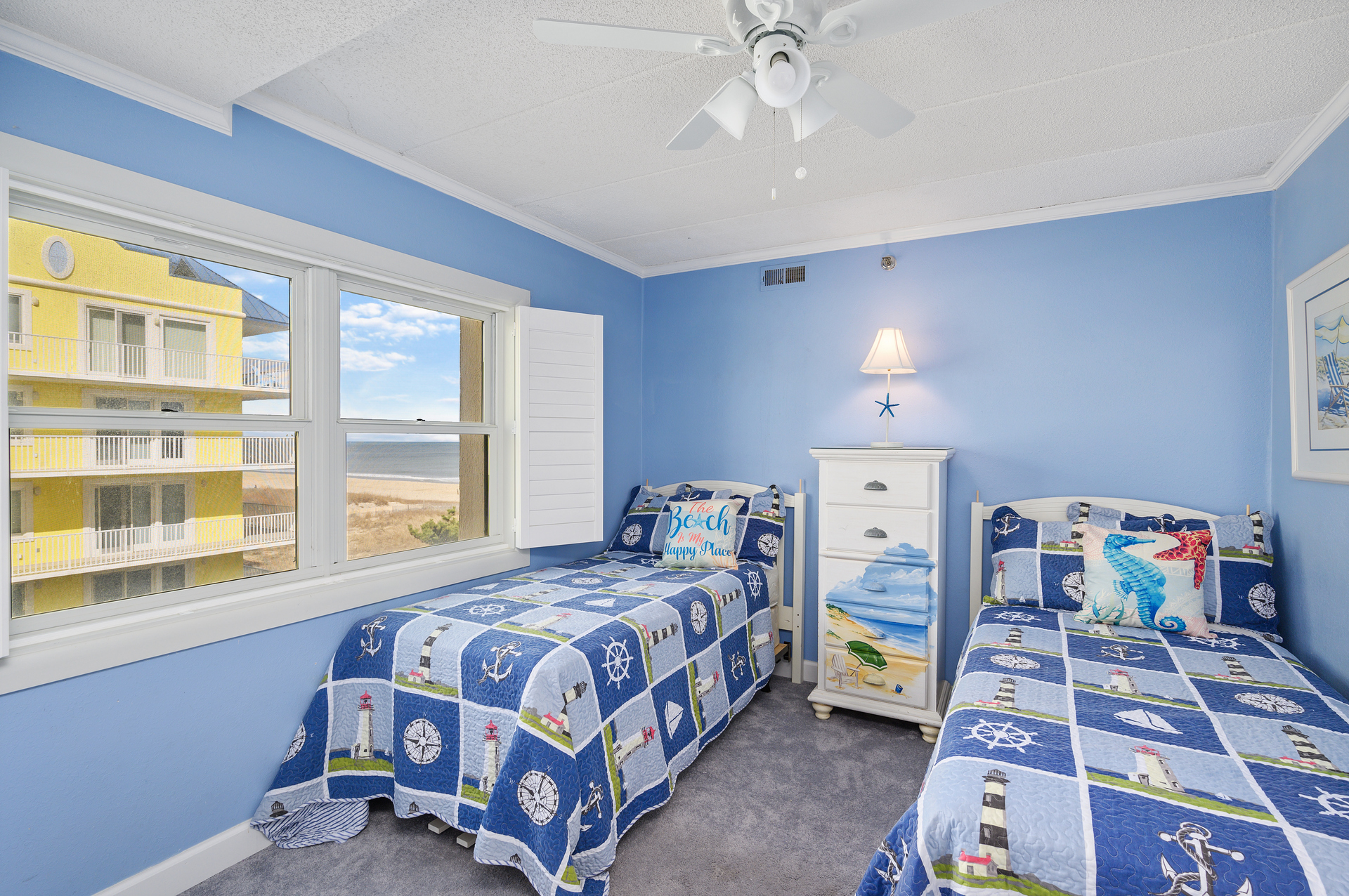 Bedroom 3 has a playful beach theme and two Twin beds