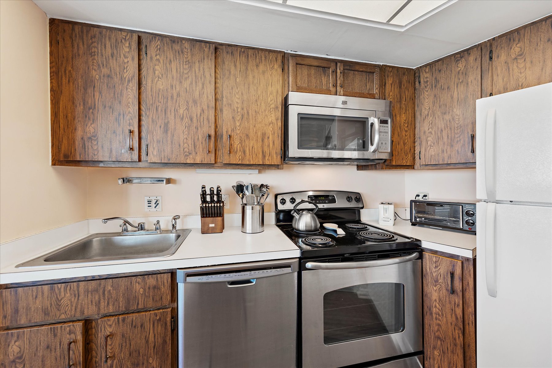 Stainless steel appliances in this kitchen will be a chef's dream!