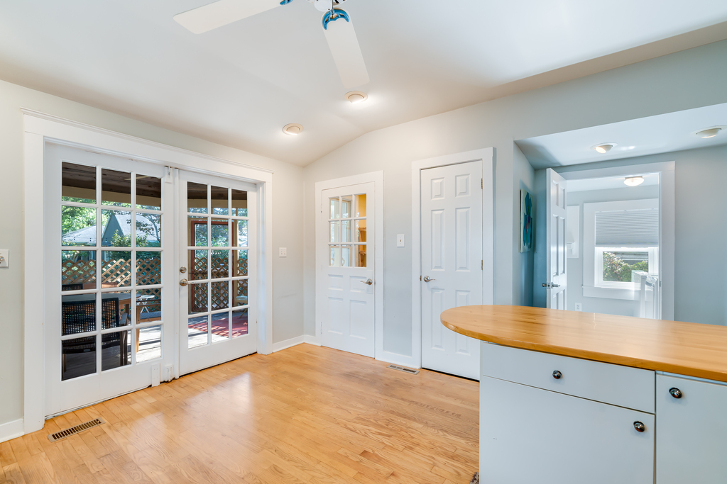Follow the French Doors out to the Screened Porch.