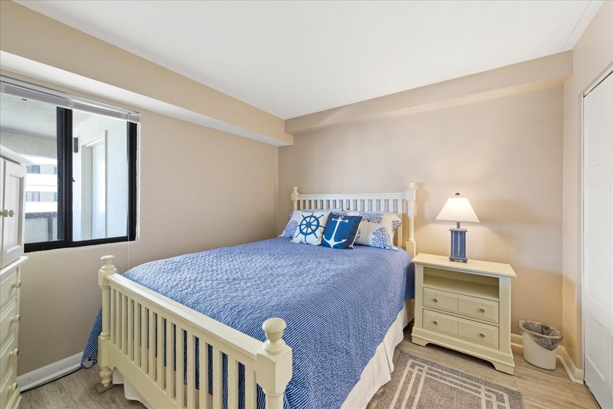 Bedroom 2 is adorned in Calming Blues.