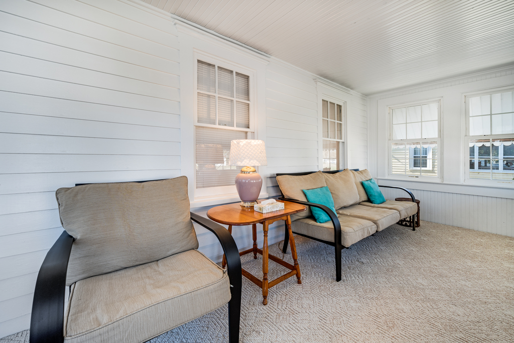 A cozy Front Porch lines the front of the house!