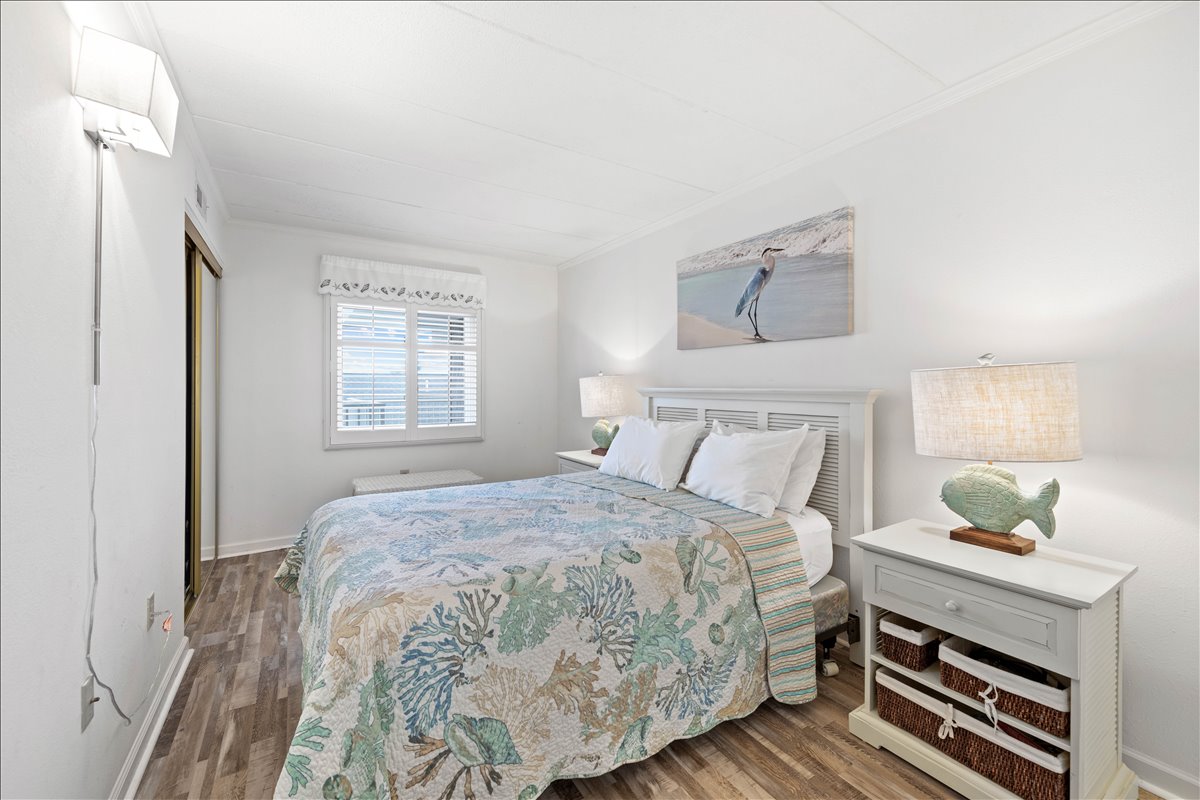 The Primary Bedroom is a beautiful space where you can unwind after a day in the sun!