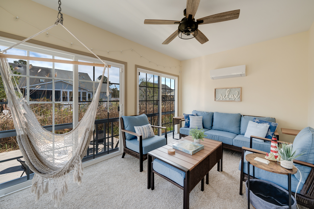 Off the Living Area is an awesome Sunroom.