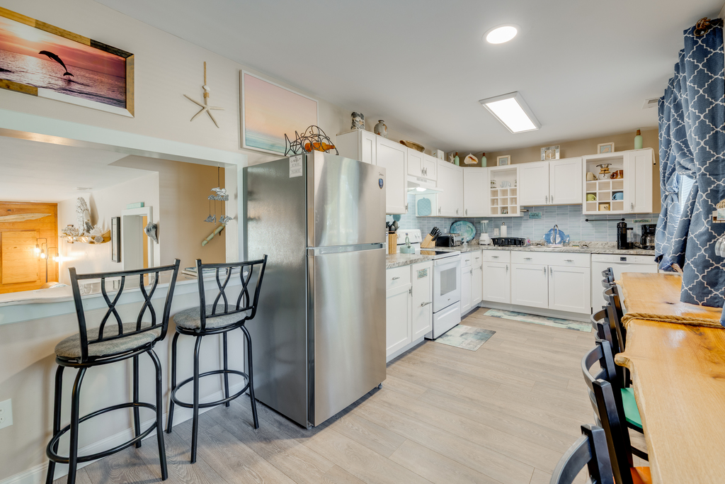 This adorable 4 Bedroom Townhome is great for your large family, or 2 families traveling together, and sleeps 12!