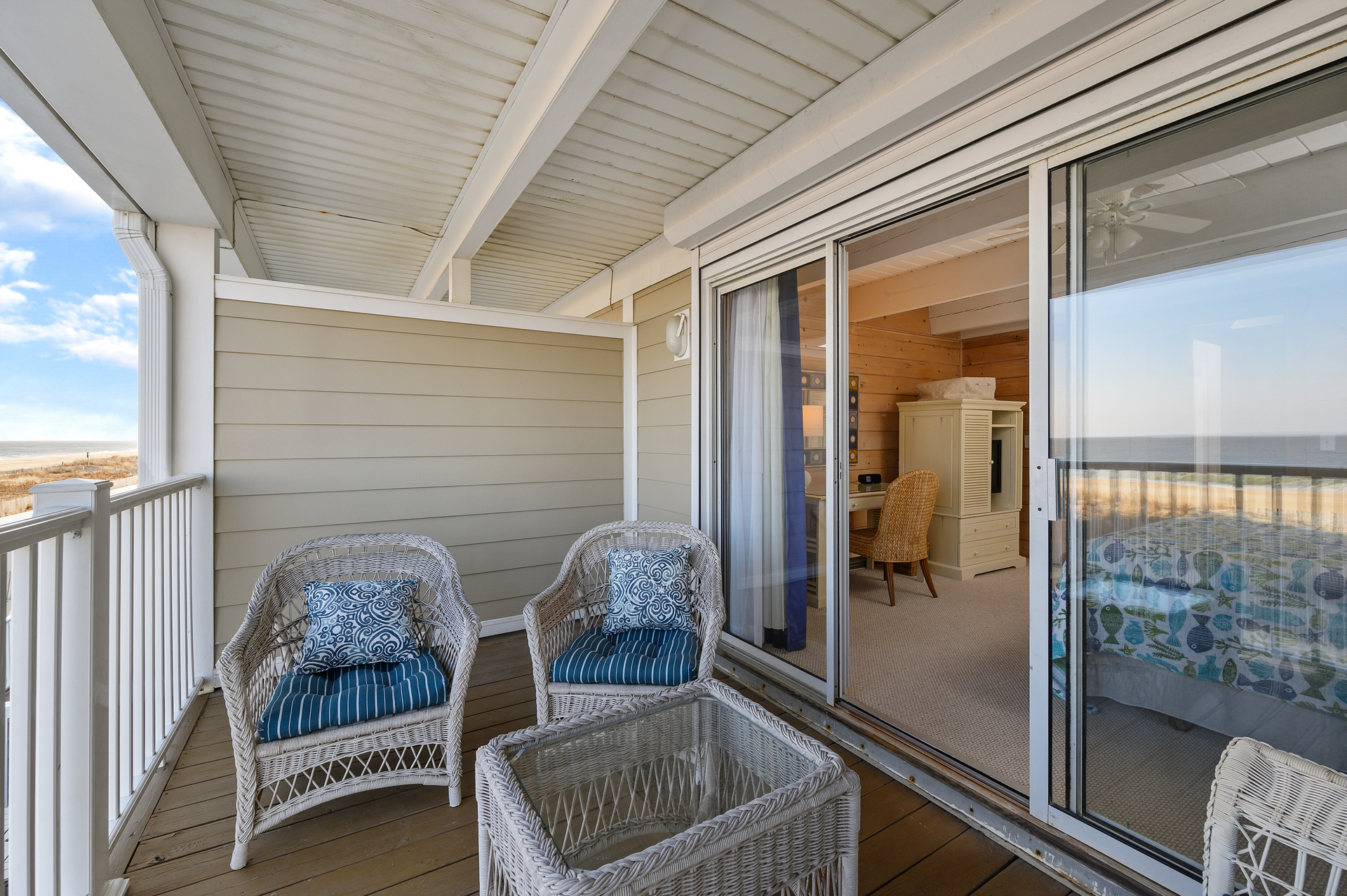 Take a sip with friends in the comfy wicker seating.