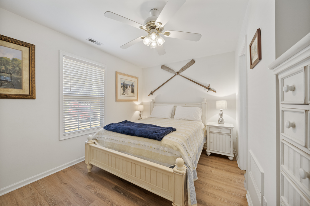 Serene Coastal Master Bedroom with comfy Queen Bed.