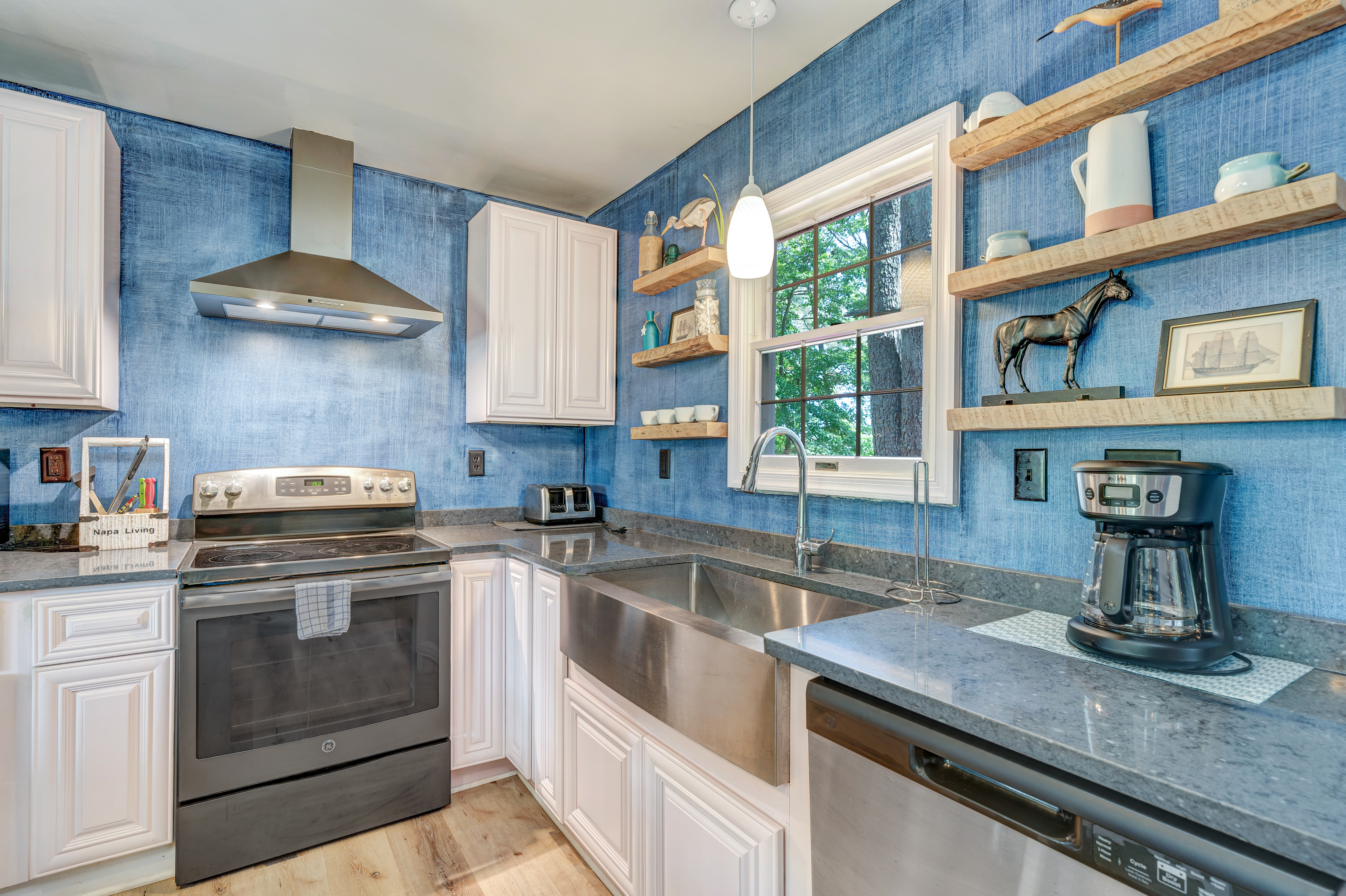 Stainless Appliances and Farmhouse Sink.