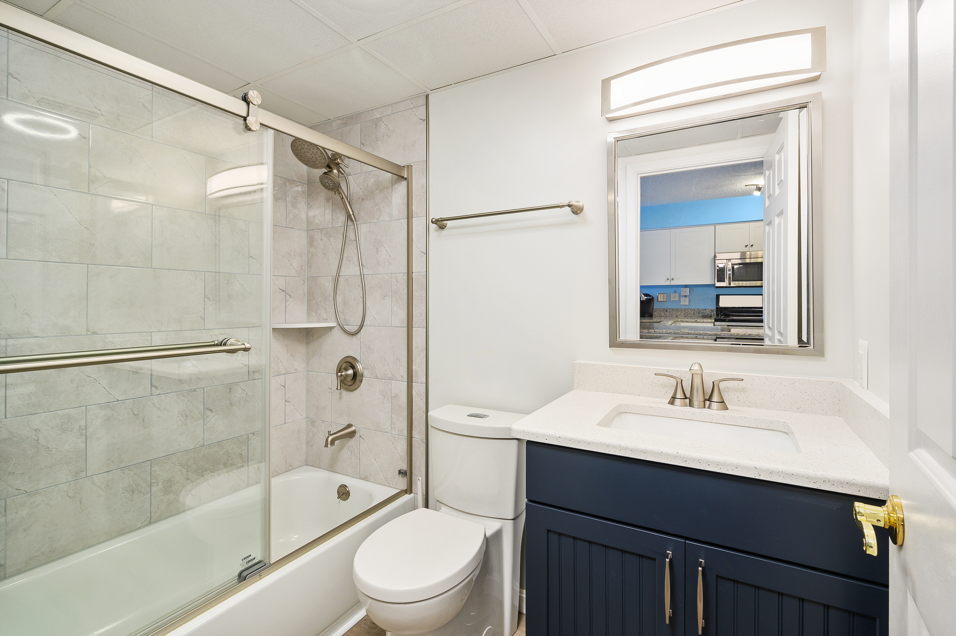 Spacious, shared Full Bath with Custom Tile Shower/Tub Combo.