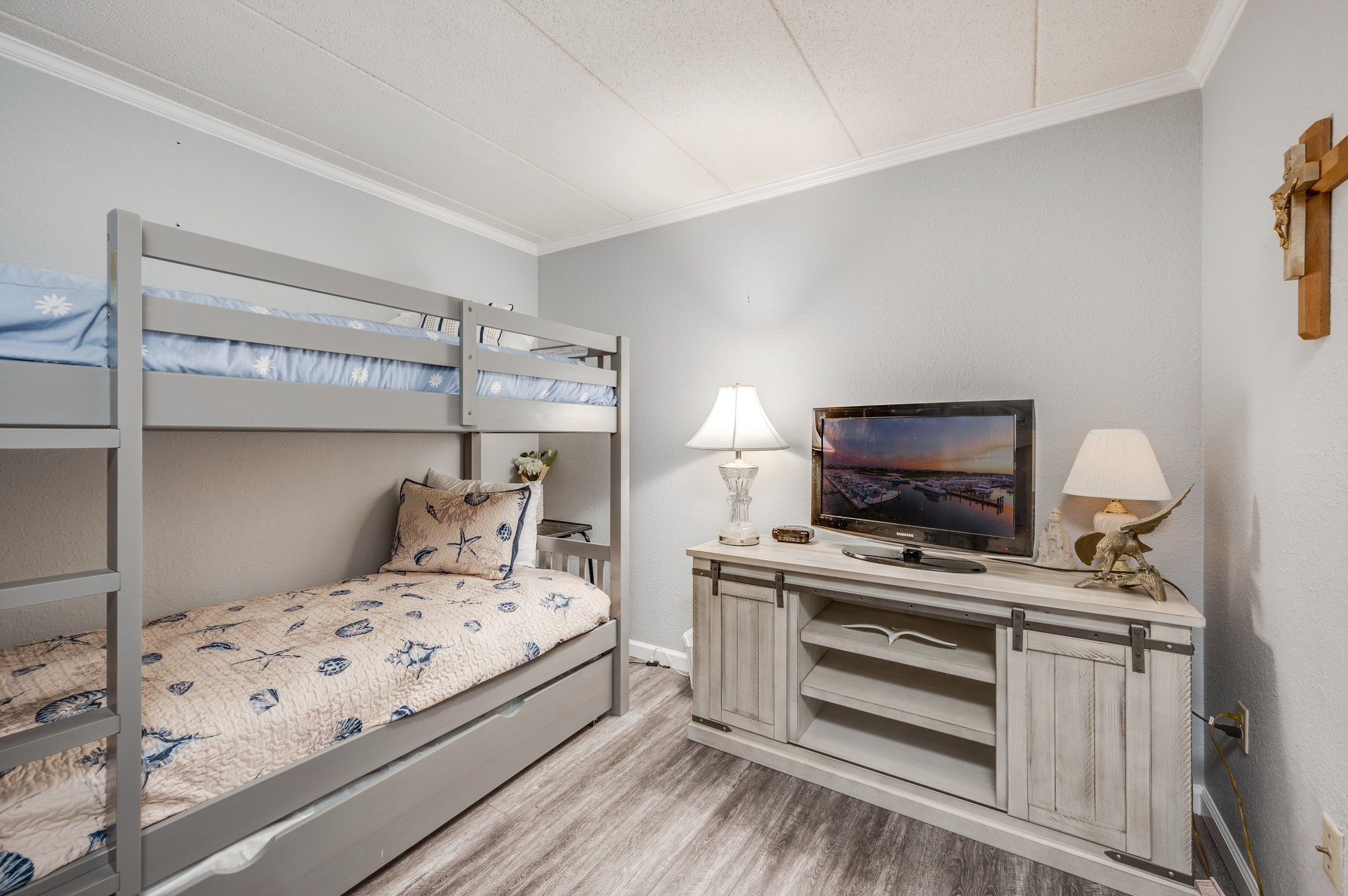 Bedroom 2 has a TV to help keep the kids happy and occupied