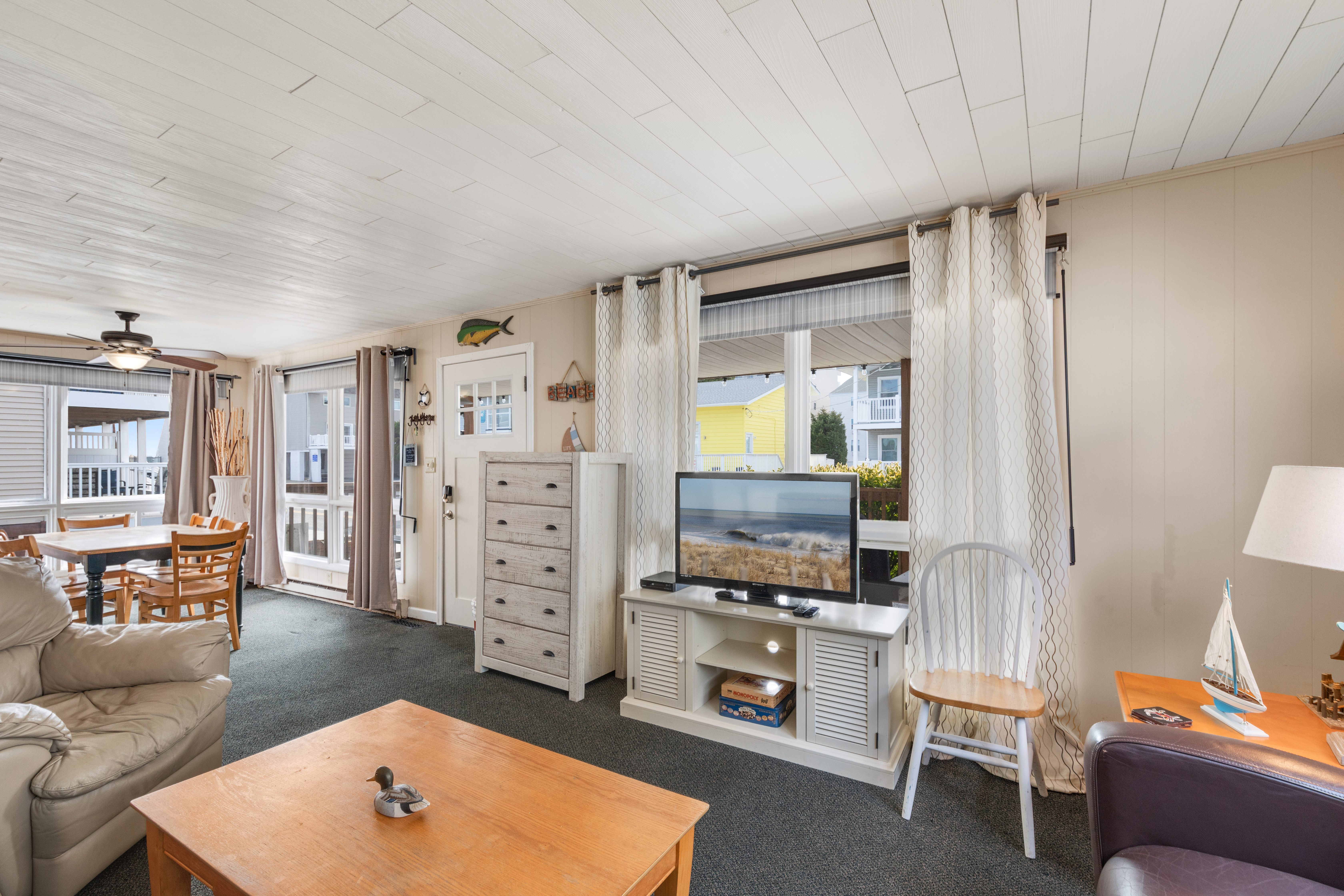 Relax in the spacious Living Area after a fun-filled day on the Beach, and enjoy Free Wi-Fi and Flat Screen TV!