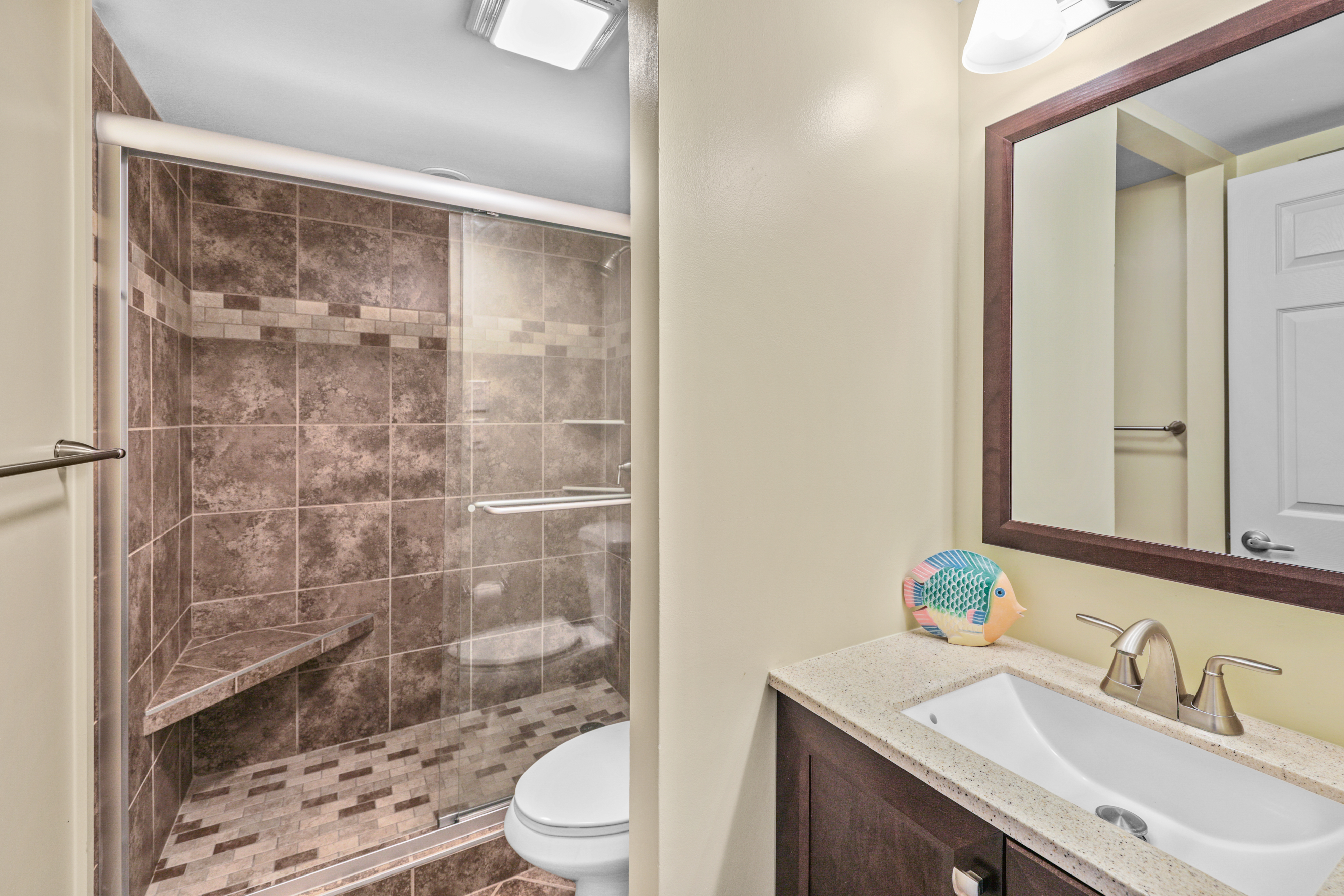 Full size Primary Bath with Custom-Tile Walk-In Shower.