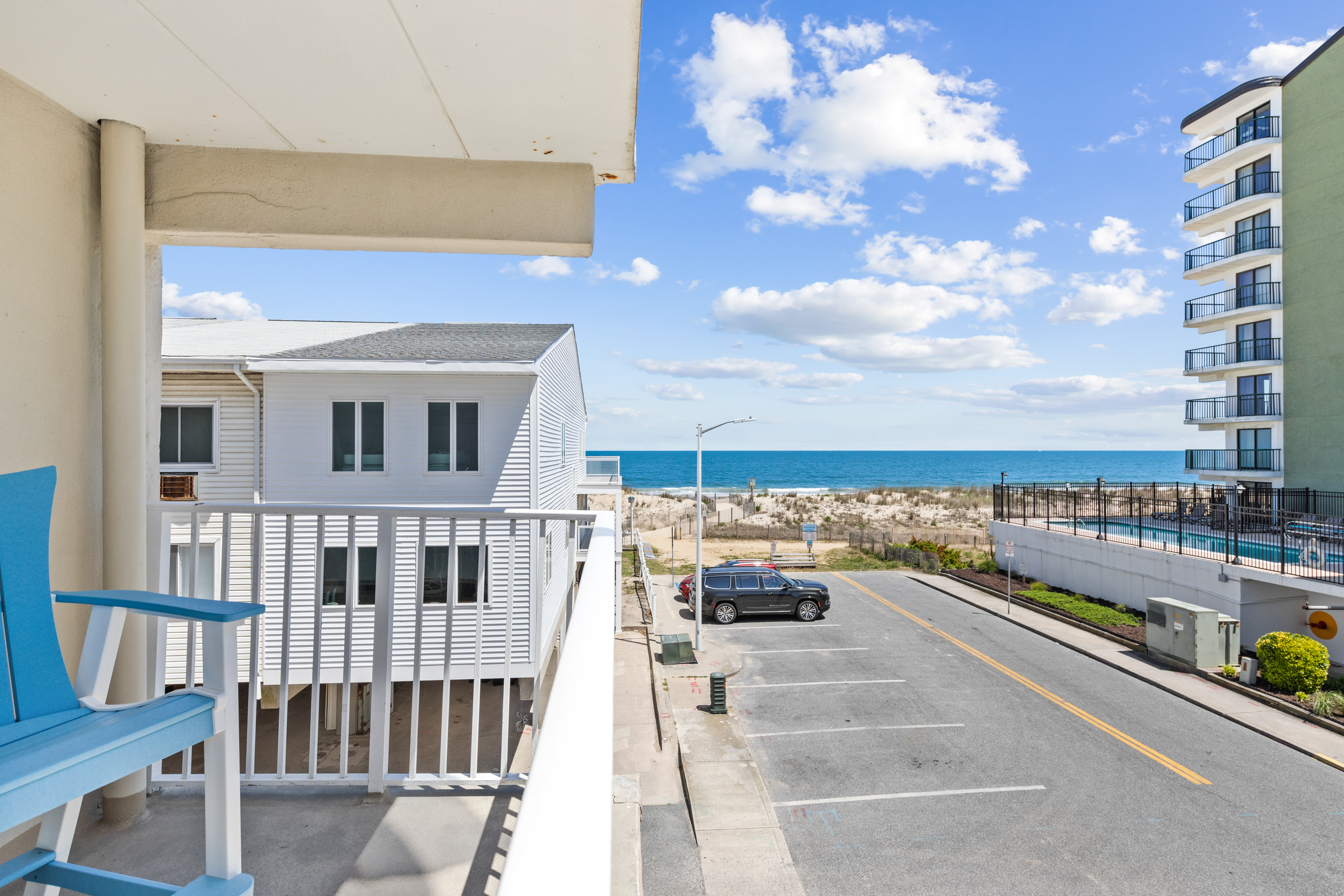 Only steps from the waters edge, enjoy sitting on your furnished balcony.