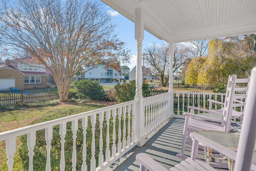 Sit on the Covered Front Porch and sip sweet tea while watching our Island come to life each morning.