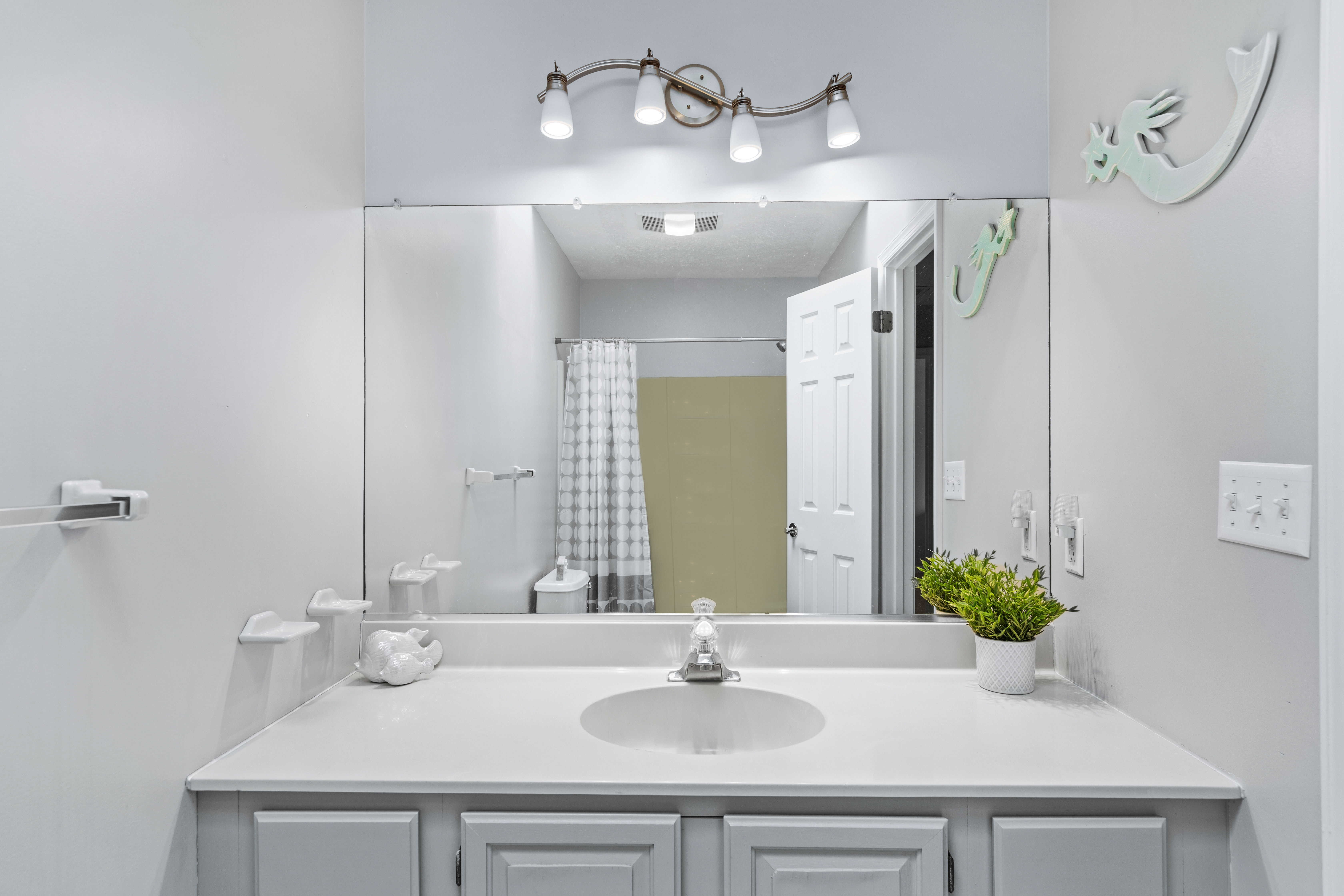 Shared Full Bath convenient to all Bedrooms.