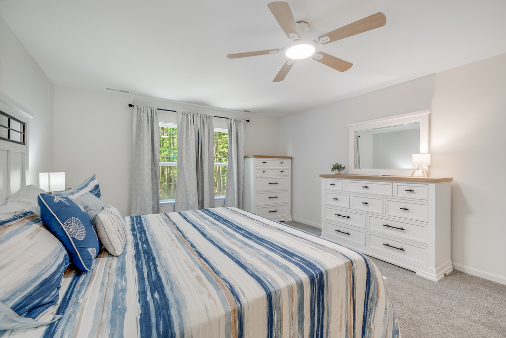 Bedroom 1 has a luxurious King Bed and tons of natural light.
