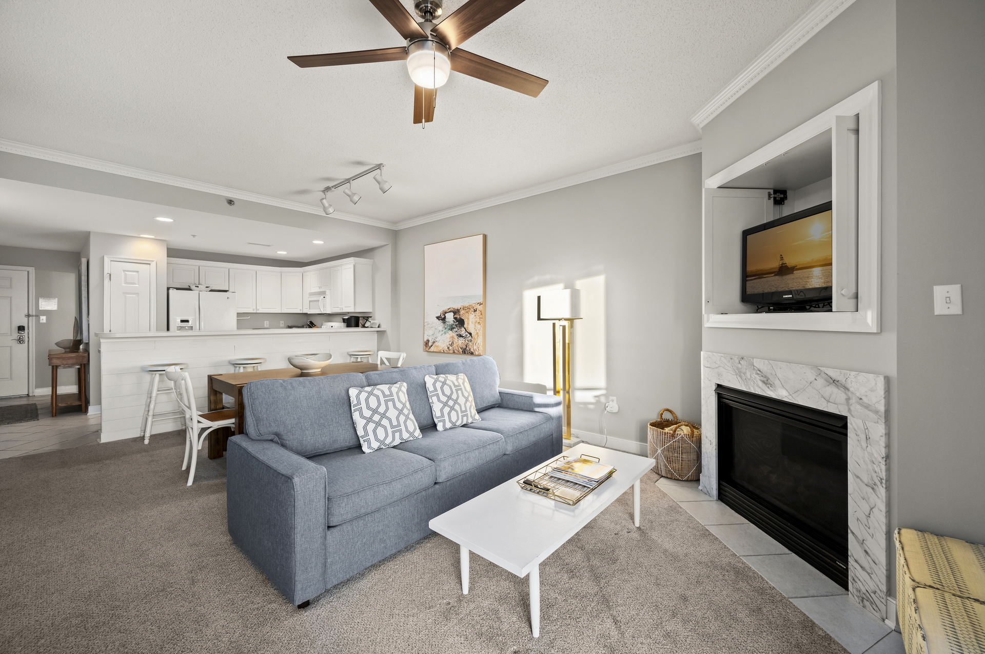 Gorgeous Colors of Sand and Surf. Fireplace is decorative only.