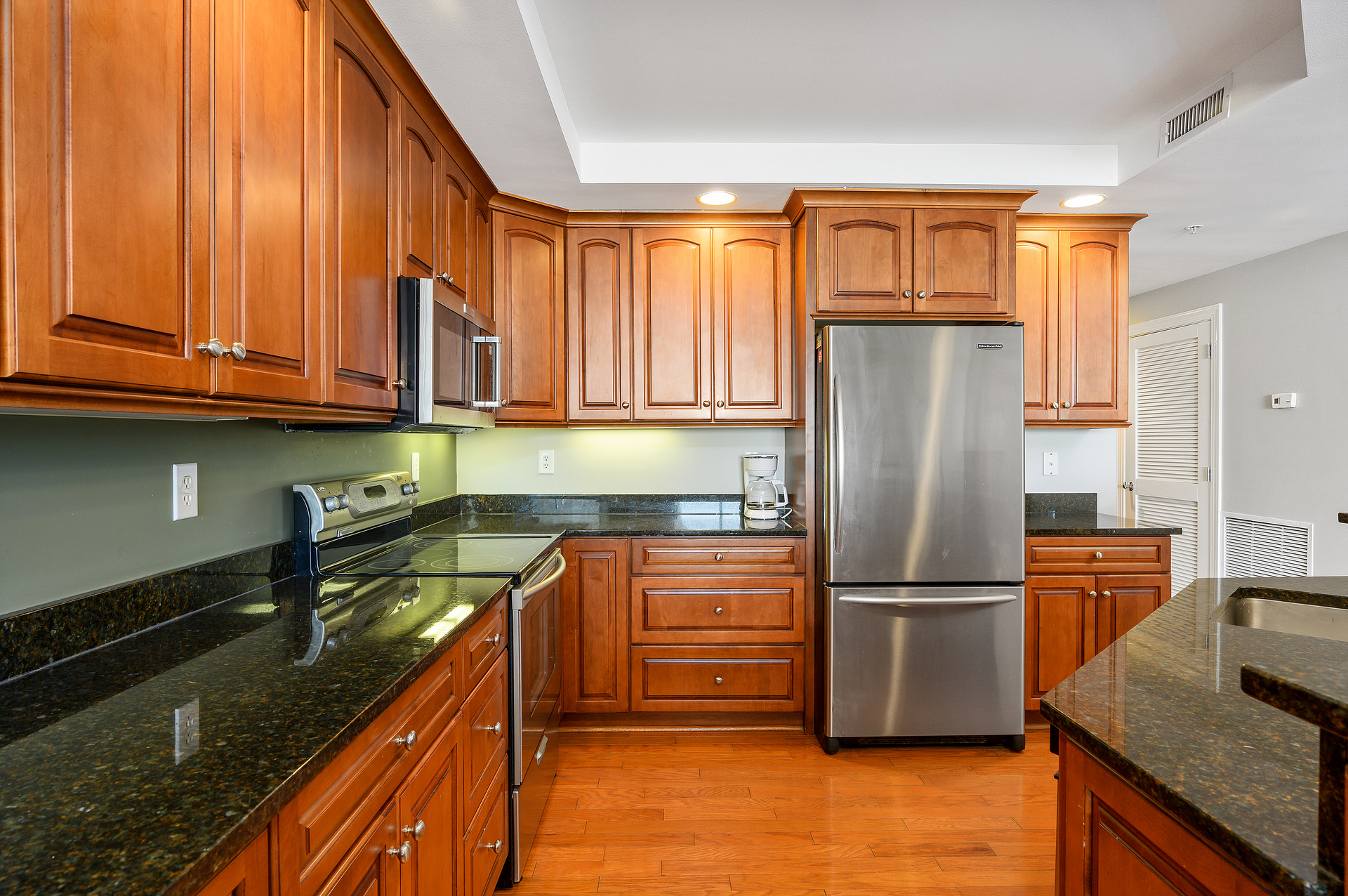 Beautiful granite counters and Stainless Steal Appliances encompass the Kitchen.