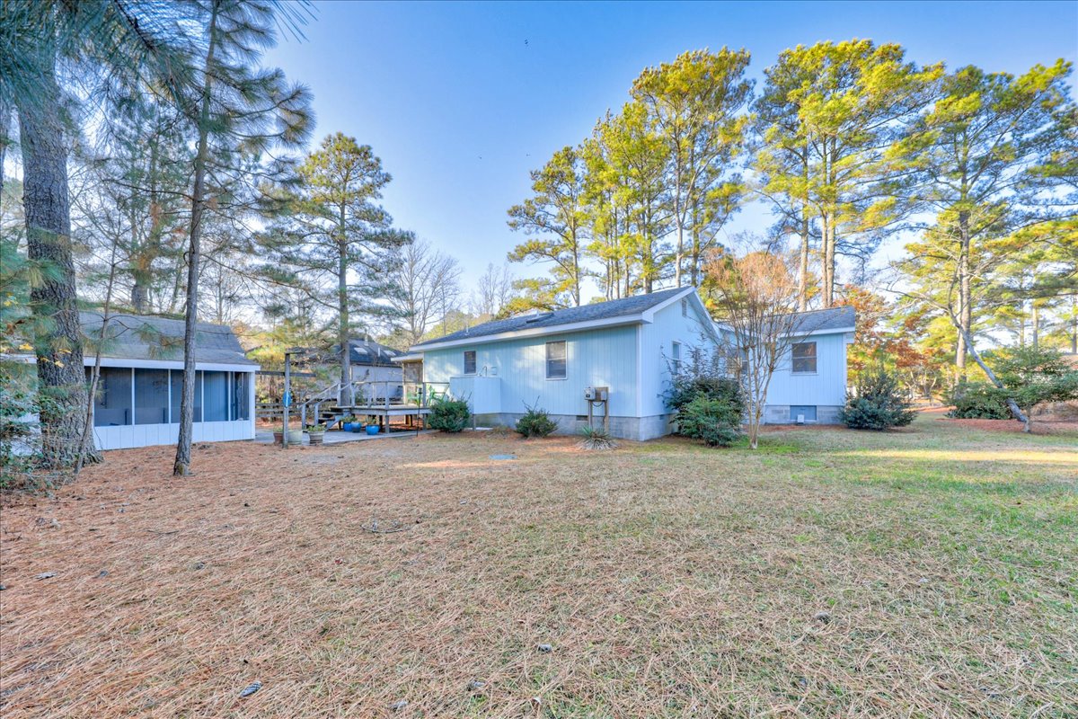 The backyard has a classic Ring Toss Game.