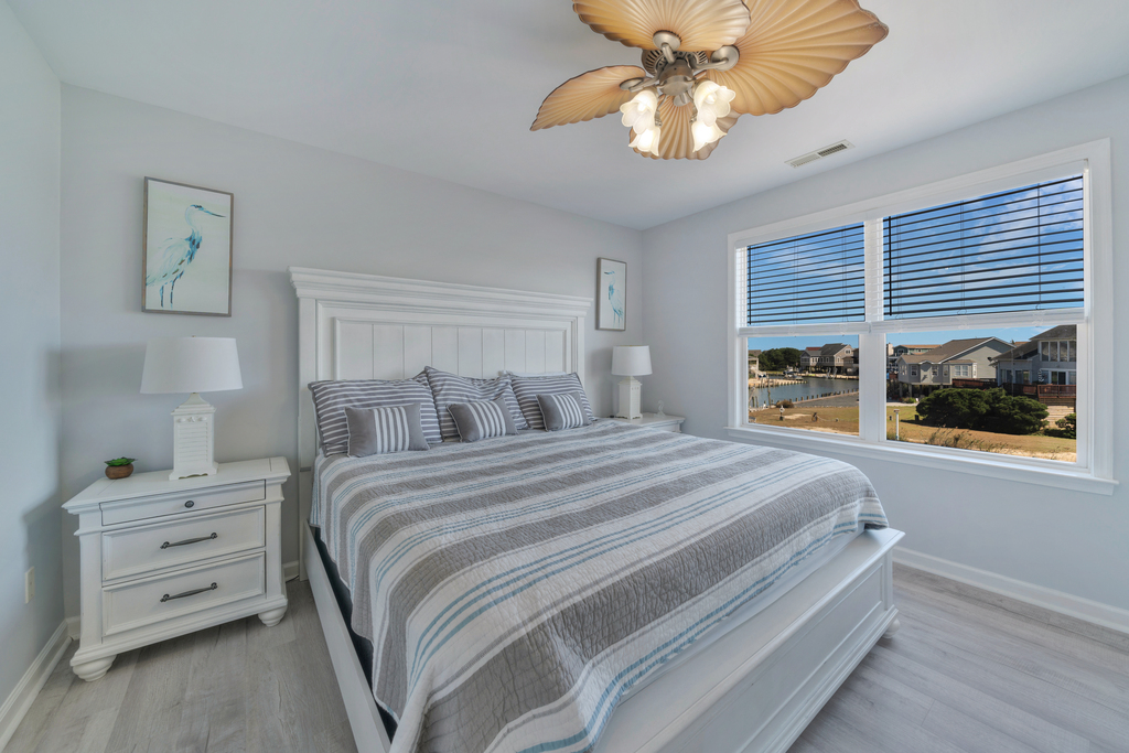 Bedroom 2 has another comfy King Bed and Water Views.