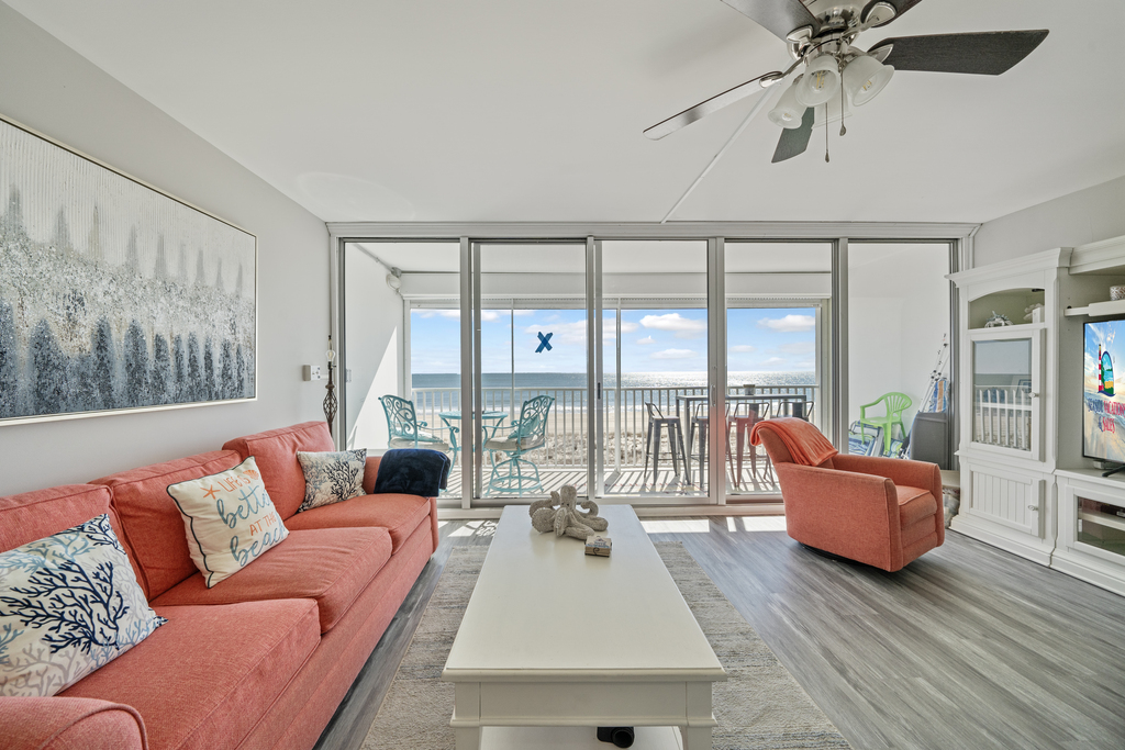 You'll adore the coral beachy atmosphere in this Open Living Area!