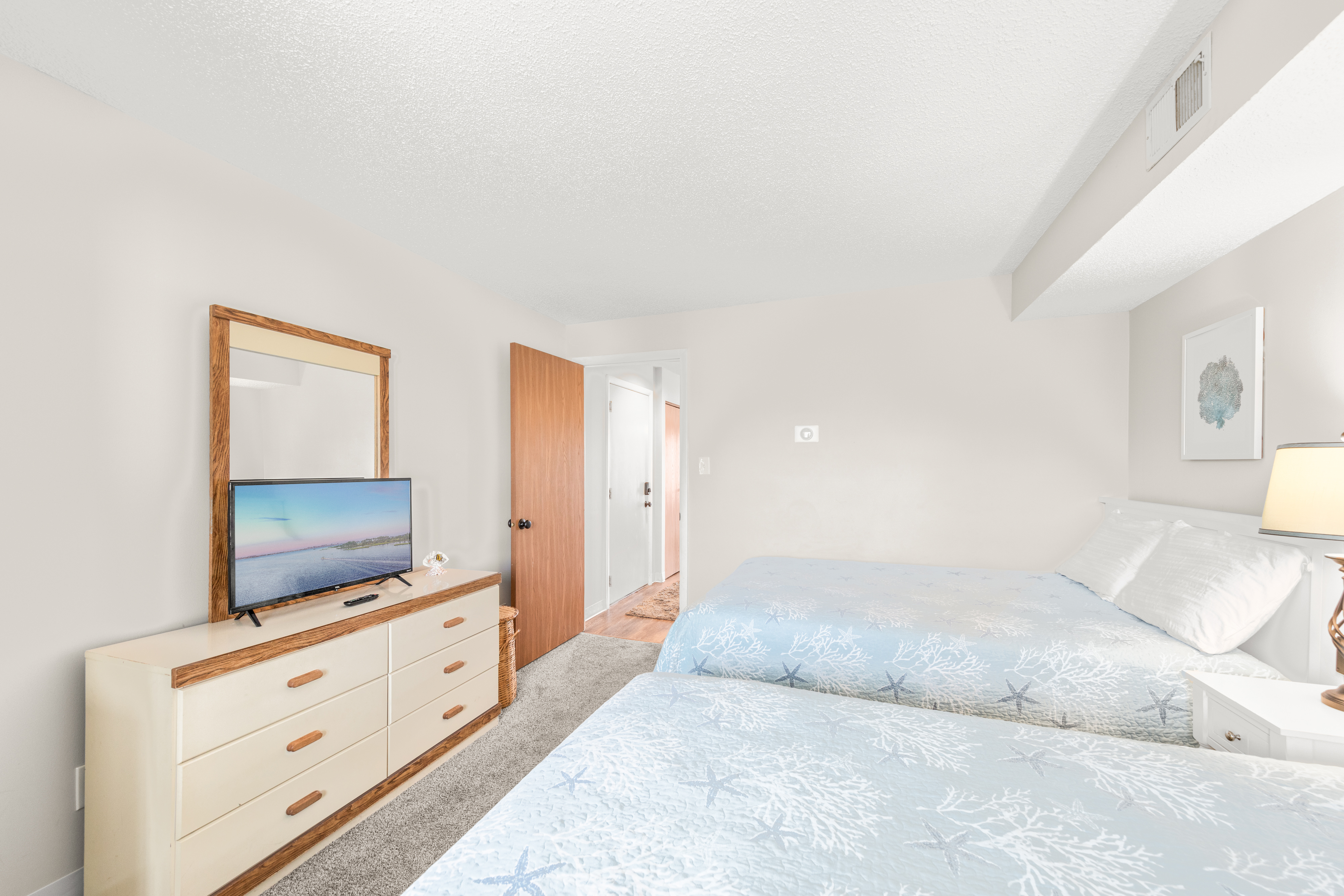 Sink into bed and relax while watching your favorite movie on the Flat Screen TV.