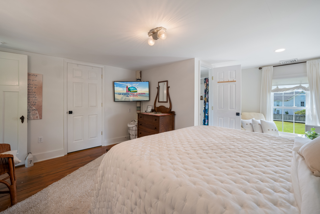 Flat Screen Streaming TV in Bedroom 1.