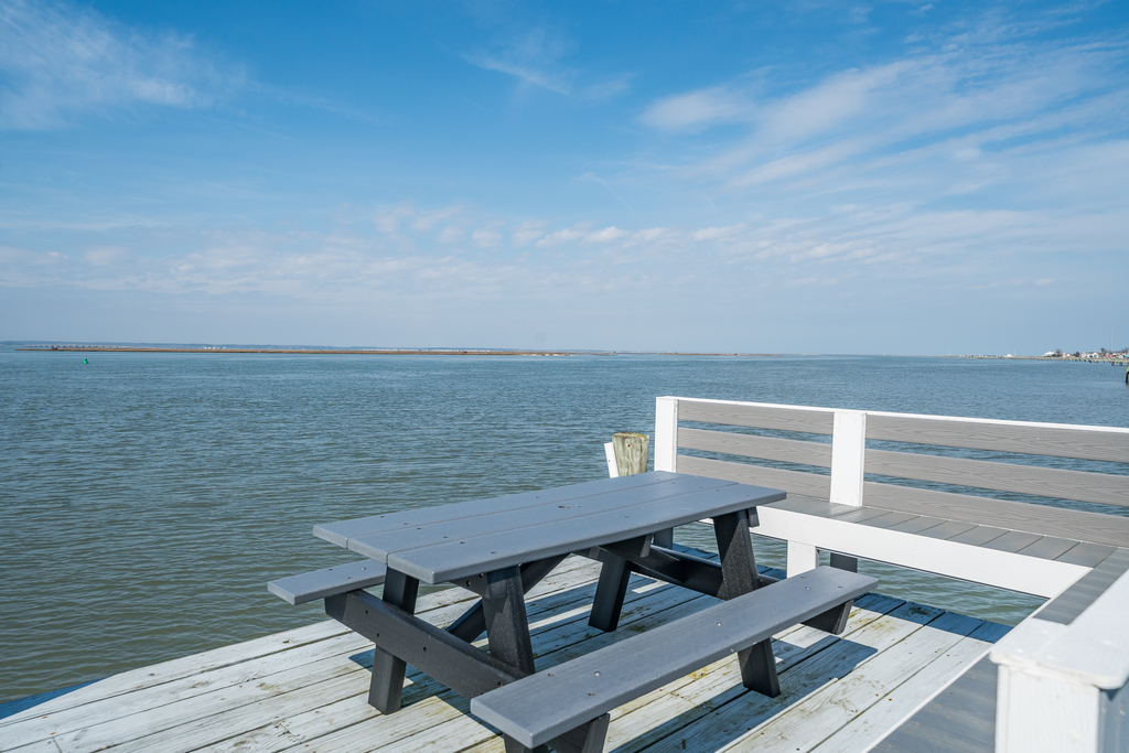 Or, you can dine by the water's edge at the Picnic Table on the Shared Dock!